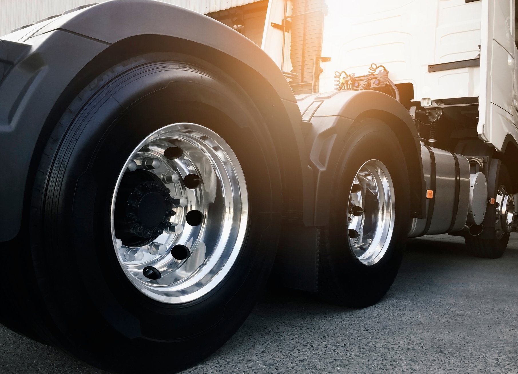 Closeup truck wheels and truck tires of semi truck, industry truck transportation.